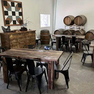 tables, chairs, and barrels