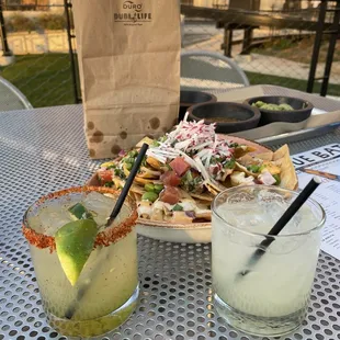 House marg with jalapeño and speciality pour off the tequila list made into a marg.