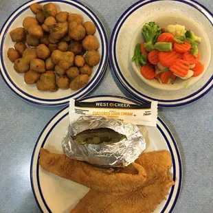 Fried okra, baked potato, steamed vegetables , and Alaskan flounder