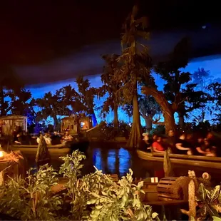 At our table looking at Pirates of Caribbean riders float by.