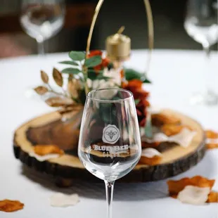 a wine glass on a table