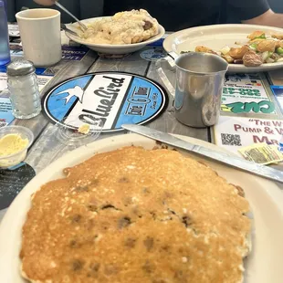 Gluten-free blueberry 2 Pancakes Breakfast and the Country style Benedict breakfast with O&apos;Brien potatoes.