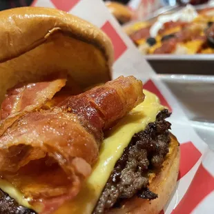 Cheese burger + bacon. Fresh, hot and delish!