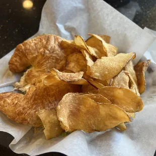 Chicken salad on a croissant with homemade chips