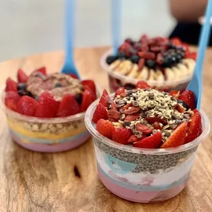 two bowls of fruit and yogurt