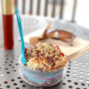 a blue spoon in a bowl