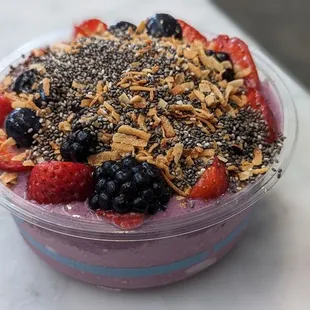 Huckleberry and Maqui Berry Yogurt base, maple quinoa granola, blueberries, blackberries, and strawberries, toasted coconut and chia seeds