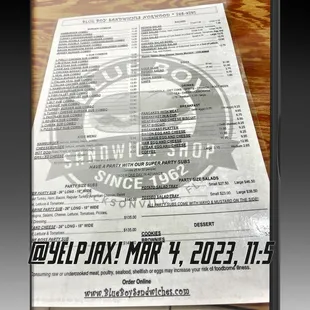 a menu for a blue boy sandwich shop