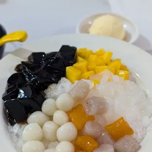 Our favorite but was water ice (no dairy). Taro Ball Grass Jelly w Sticky Rice Ball.