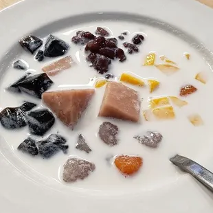 Coconut milk with taro and different fruits and grass jelly