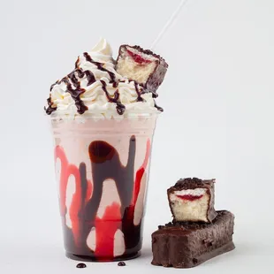 a milkshake and a piece of chocolate