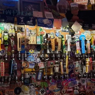 a variety of beer taps in a store