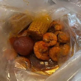 C1. Shrimp No Head 1lbs potato's and corn with the juicy special sauce