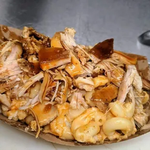 On special rotation.... Mac &amp; cheese with Huli Chicken. Cheddar, mozzarella &amp; provolone.. then baked in the smoker! (Not offered every day)