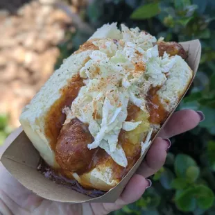 On special rotation- Huli Brat! Sweet bratwurst on Kings Hawaiian rolls, w/ smoked pineapple, Huli sauce &amp; homemade pineapple coleslaw!
