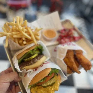 Chicken fingers, burger, cheeseburger