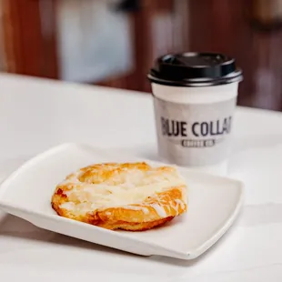 a pastry and a cup of coffee