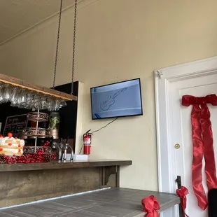 a bar with red ribbon