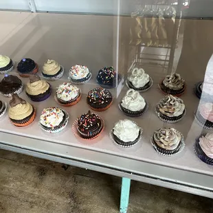 a display of cupcakes