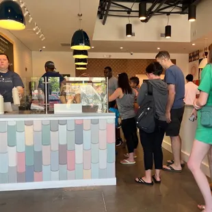 a group of people standing in line
