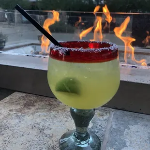 The $15 Cadillac Margarita is mediocre at best...the fire backdrop is beautiful.