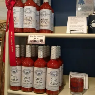 a shelf of sauces and condiments
