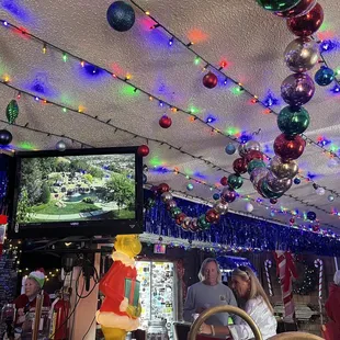 a woman sitting at a bar
