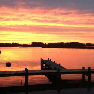 a dock at sunset