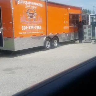 a food truck parked in a parking lot