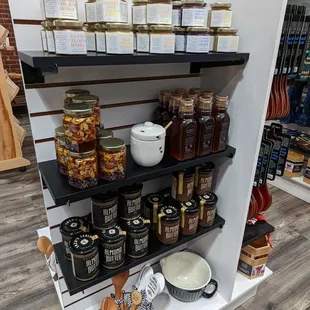a display of jars of food and condiments