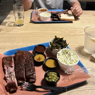Rib Plate ( sans bread) Collard Greens, Coleslaw, house made pickles and all the sauces