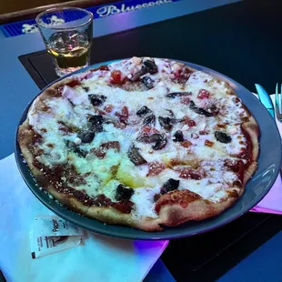 Martin can now make you a personal pizza!  The sauce is great.