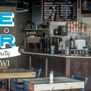 blue chairs and tables in a coffee shop