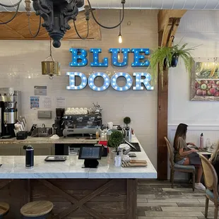 a woman sitting at a counter