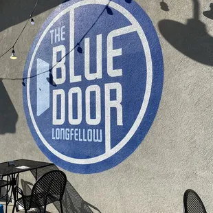 a blue door sign