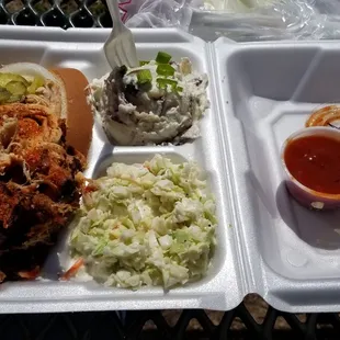 Pulled pork, potato salad and cole slaw
