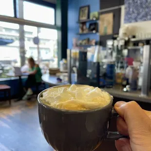 Cheers to a delicious White Mocha topped with whipped cream at Blue Dot Cafe and Coffee Bar in Alameda.