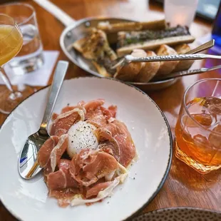 Soft poached duck egg and wood oven-roasted bone marrow