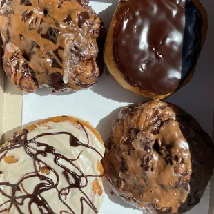 three donuts in a box