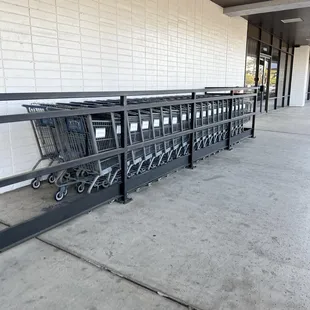 Grocery carts at the right of entry.