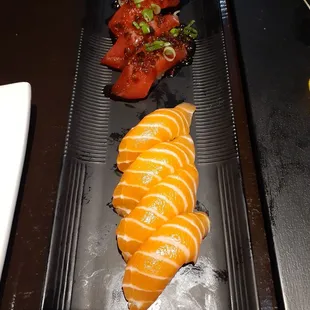 Spicy garlic tuna nigiri and salmon nigiri