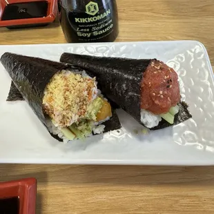 Shrimp tempura hand roll and spicy tuna hand roll