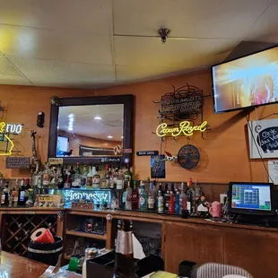 a bar with neon signs