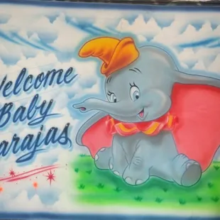 Delivering This Welcome Banner for new baby coming home.