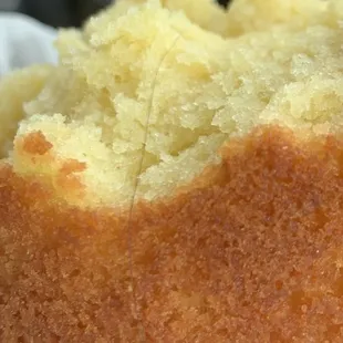 Hair baked into the frangipane cake. Neither of us has black hair or that length.