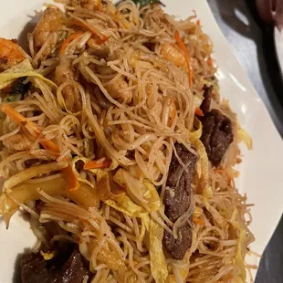 a plate of stir fried noodles