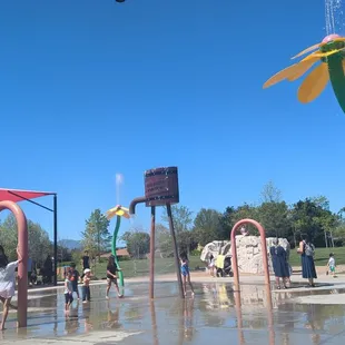 Splash pad area with the climbing boulder in the background