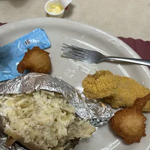 Catfish, hush puppies, coleslaw, baked potatoes, warm rolls