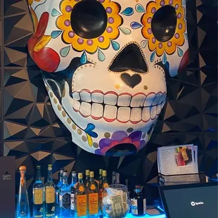 a large sugar skull on a bar