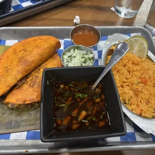 Mexican rice and delicious broth and Tacos